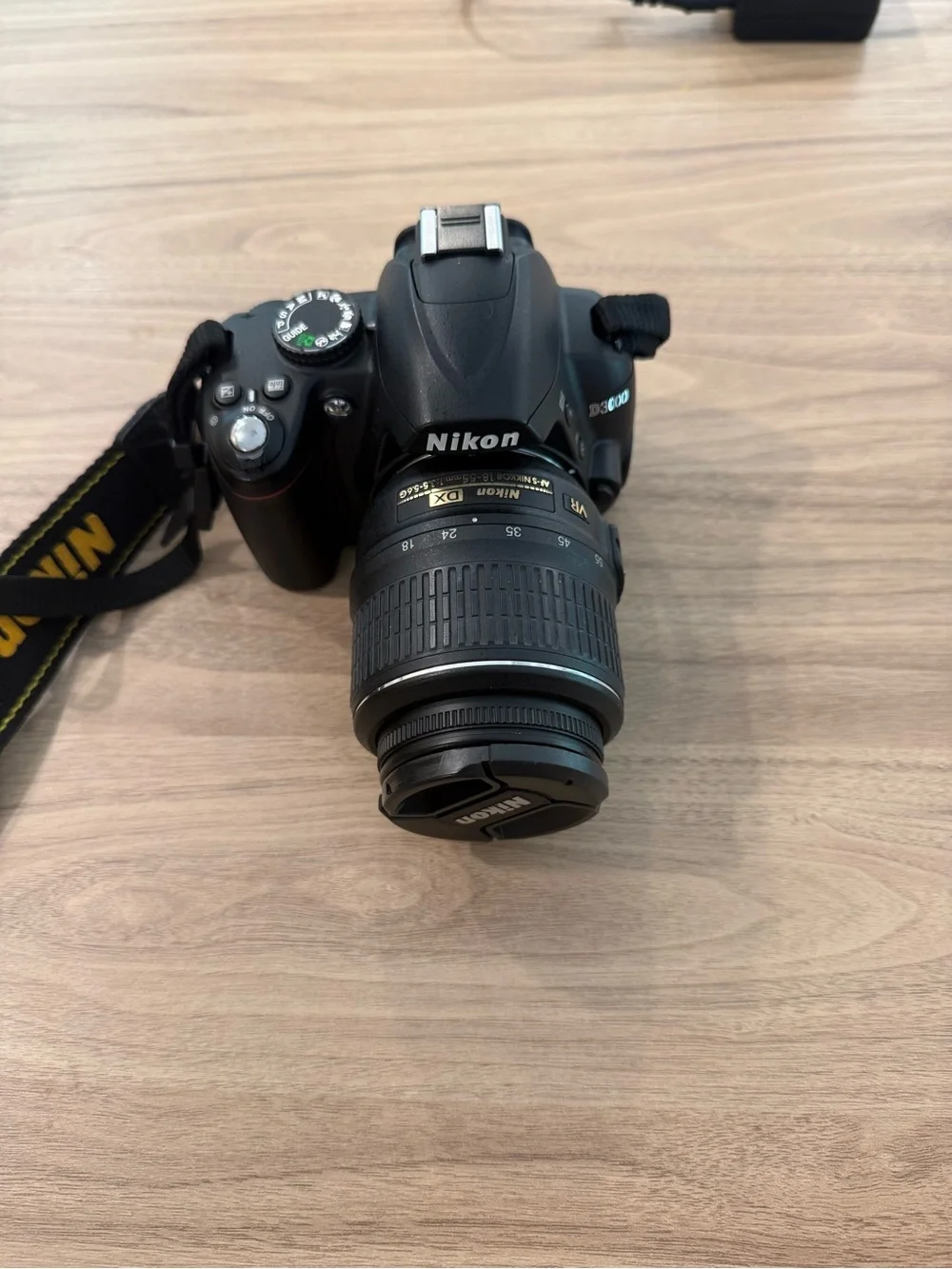 Nikon DSLR Camera Kit with Black Body and Red-Accented Bag